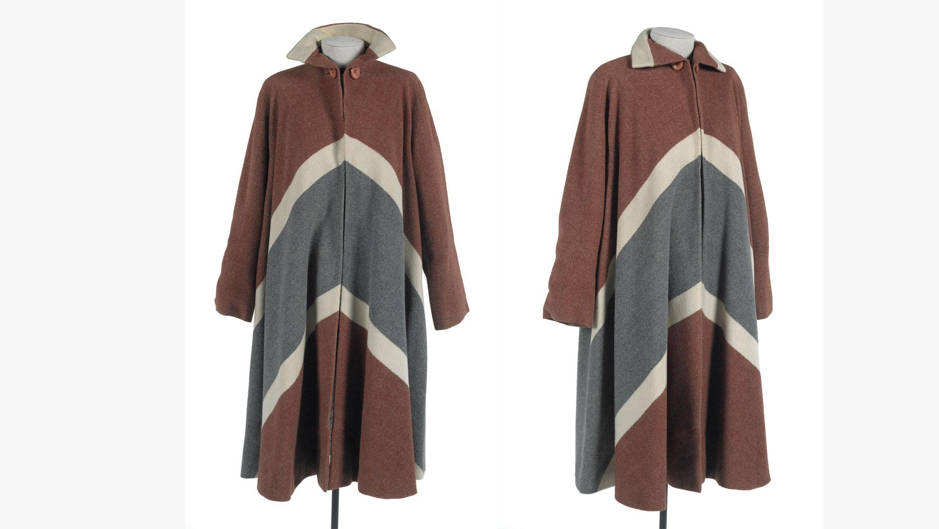 Couturier Jacques Fath commissioned the French fabric manufacturer Rodier to create the blanket cloth for this coat 1952-53. The dusky pink silk lining mirrors the cream zig zag pattern. Collection of Te Papa.