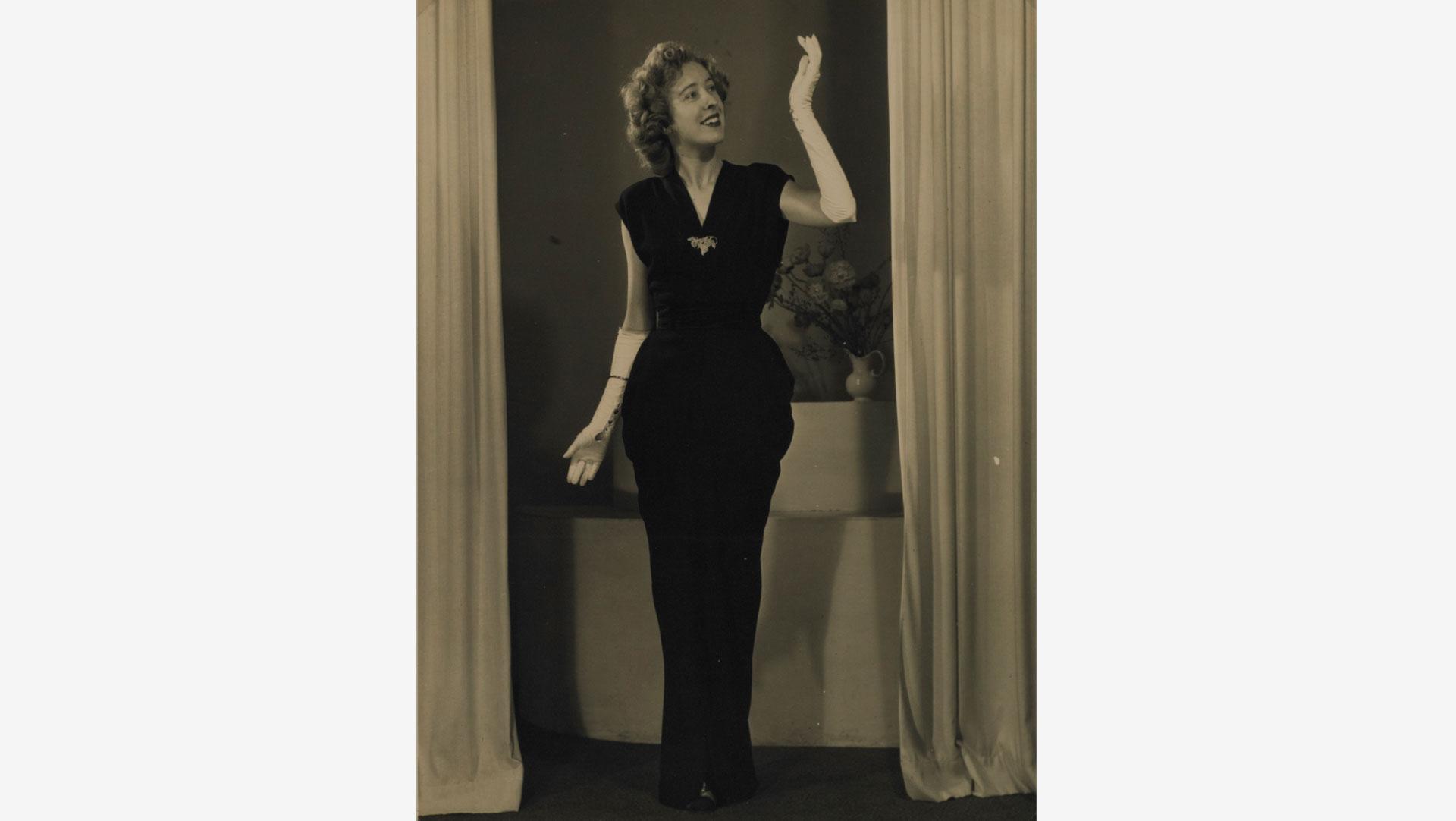 Tall and slender, the IWS's garments, like this black wool crepe gown by Frederick Starke, fitted Mary Annette like a glove. 1948.