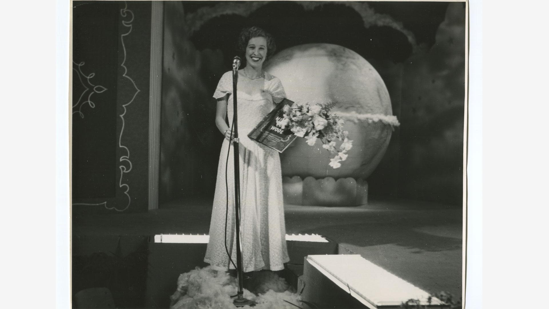 Mary Annette Hay narrating The Miracle of Wool. Collection of Te Papa.