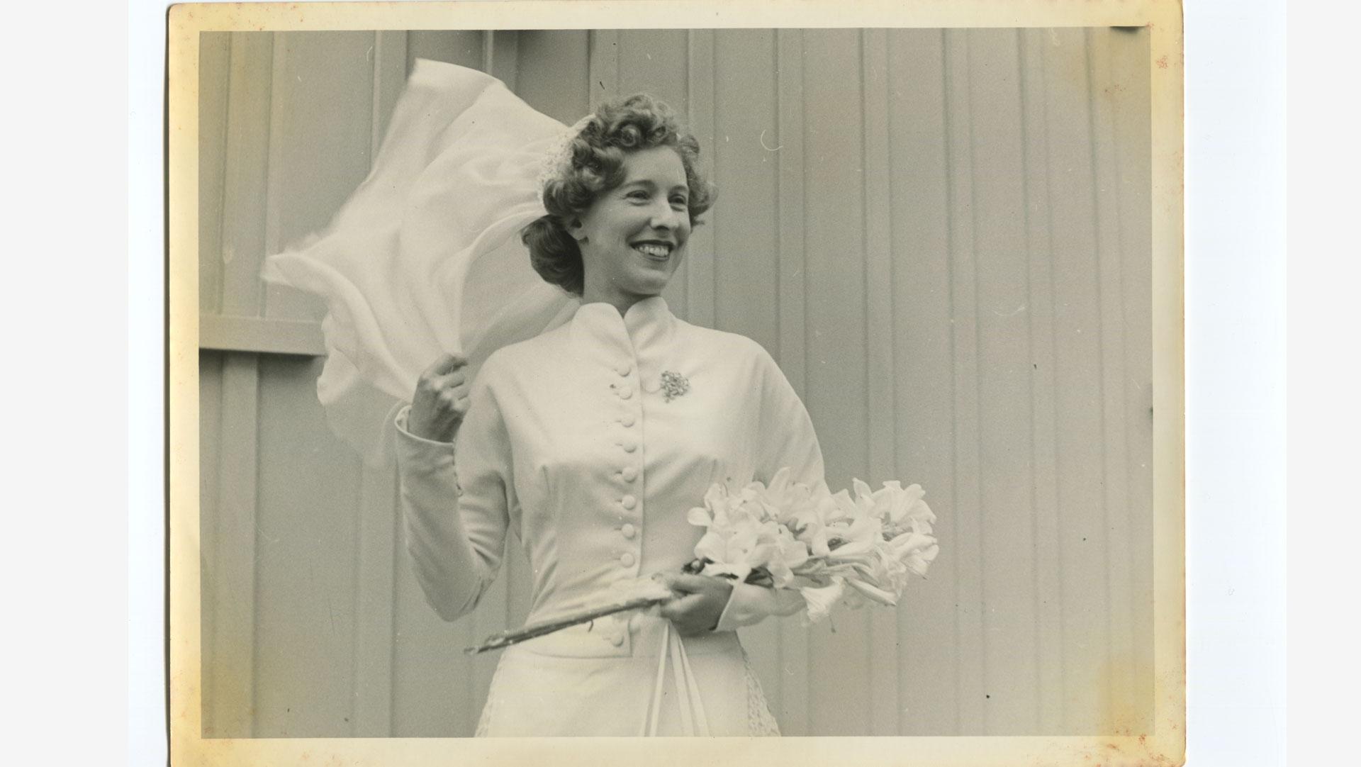 Mary Annette outside Old St Paul's Wellington in the Carosa gown 1953.