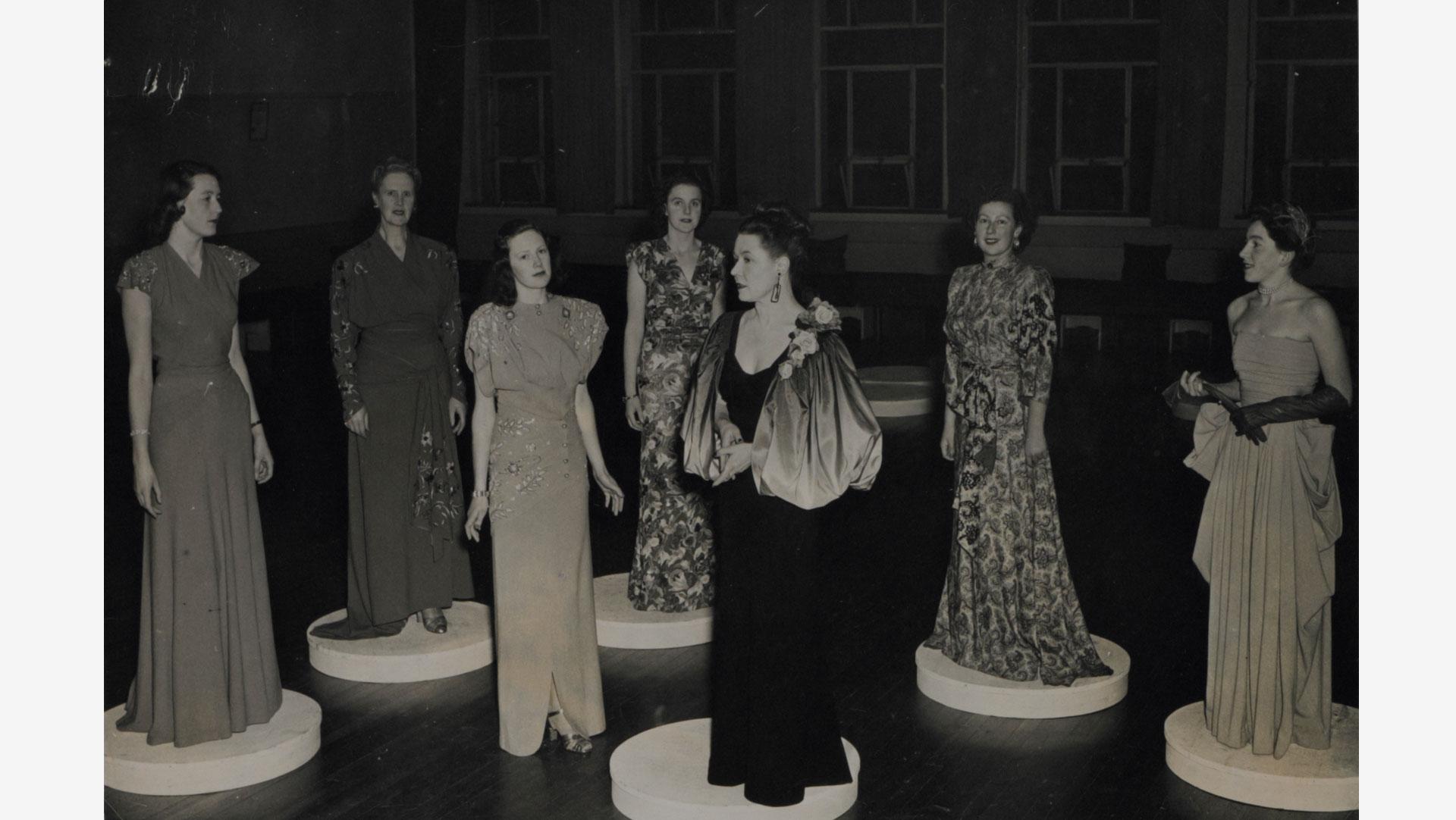 'Wool After Dark', featured garments by Worth (left), Baroque, Norman Hartnell (centre), Peter Russell, Victor Stiebel and Mercia. Collection of Te Papa.